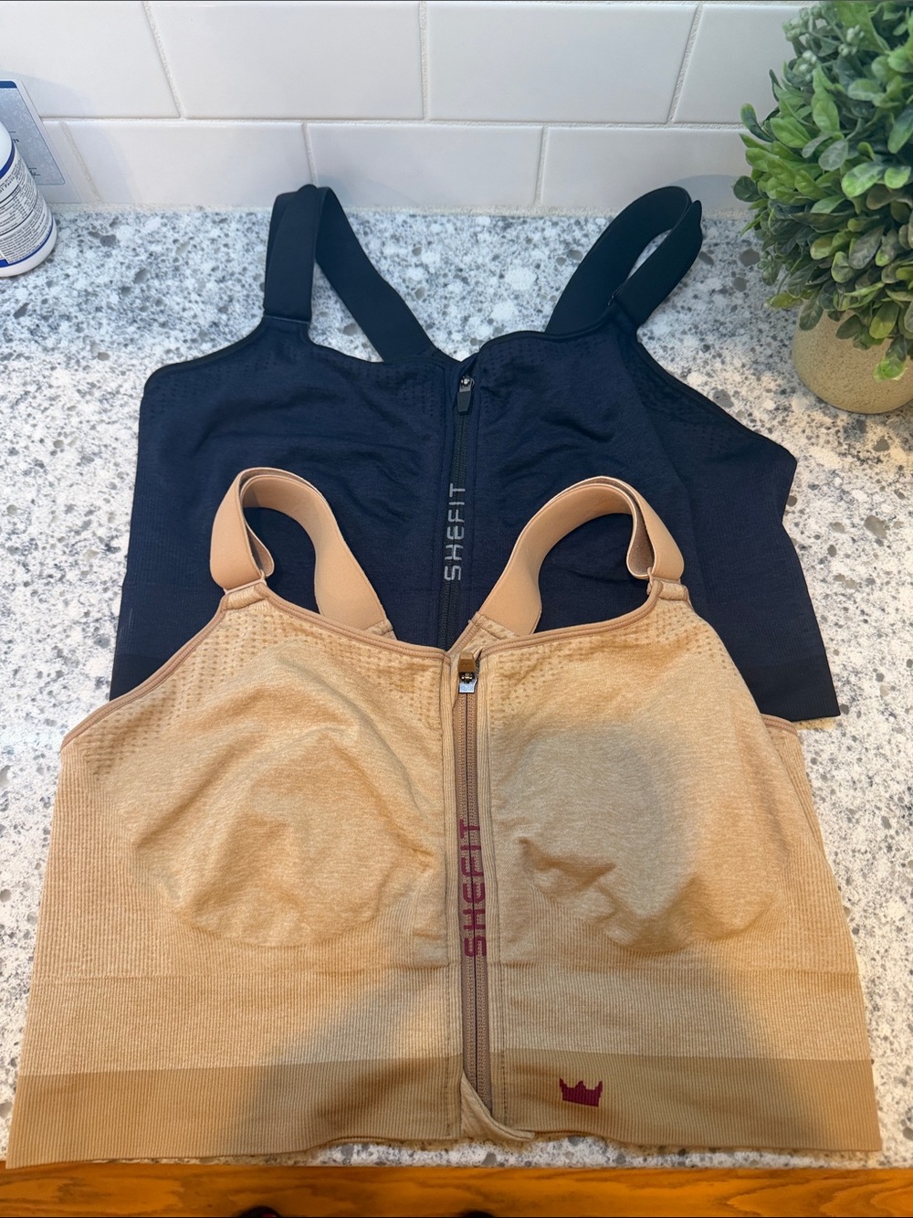 SHEFIT Front-Zip Sports Bras in Blue and Nude Tan both 5 Lux